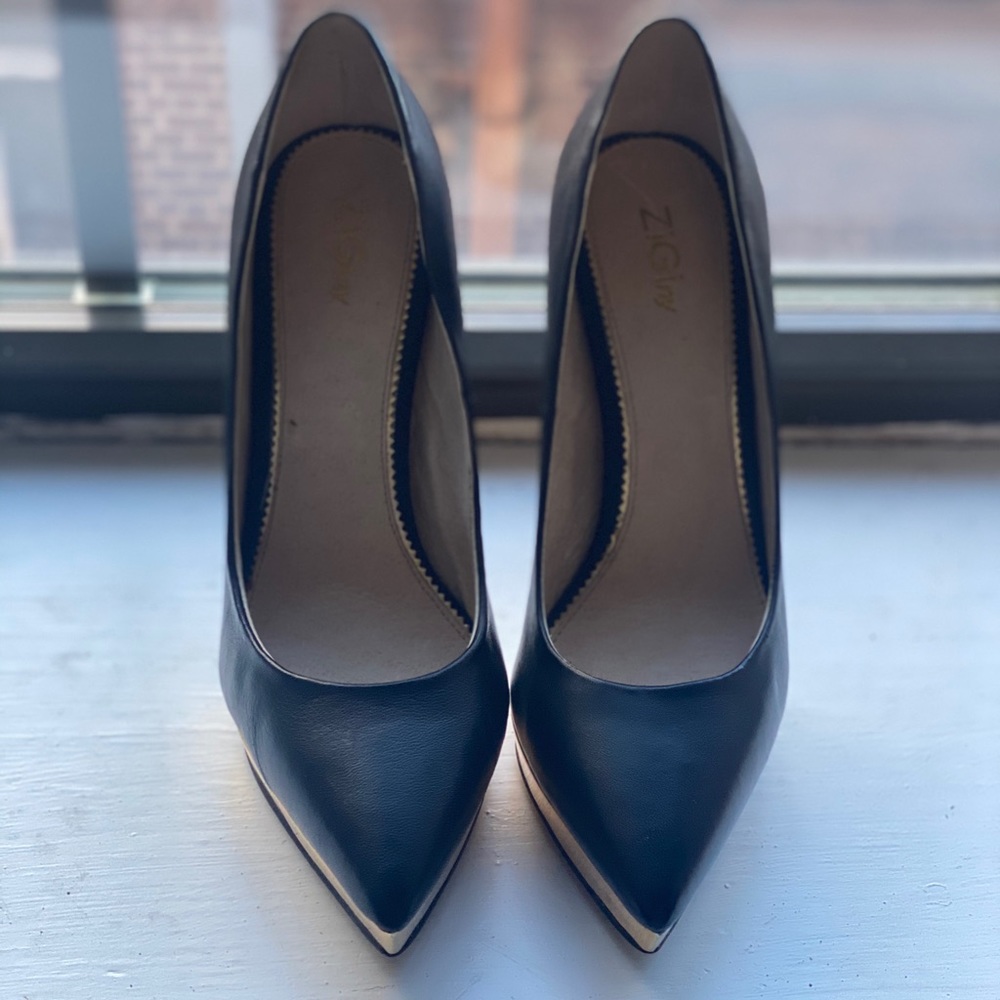 Black and gold platform pumps